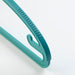 A picture of the attractive and eye-catching color of the IKEA Turquoise Hanger, which adds a pop of color to a closet or wardrobe.