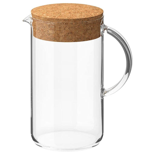 Digital Shoppy IKEA Jug with lid, Clear Glass/Cork, 1.5 l , A dark green and cork IKEA jar with lid, standing on a wooden shelf with a variety of dry goods inside. (51 oz)