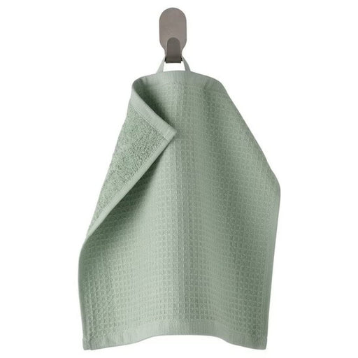 Four light green washcloths from the Ikea 6 Piece Combo Set, stacked on top of each other.