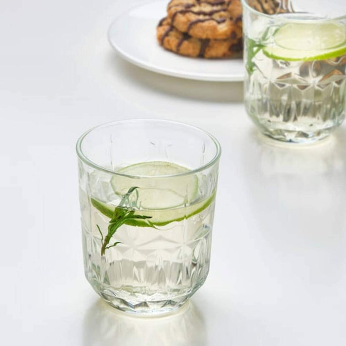 KEA patterned glassware collection featuring jars, tealight holders, and more. Add elegance to your home decor.