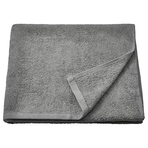 A grey  bath towel from the Ikea 6 Piece Combo Set, draped over a white bathtub.