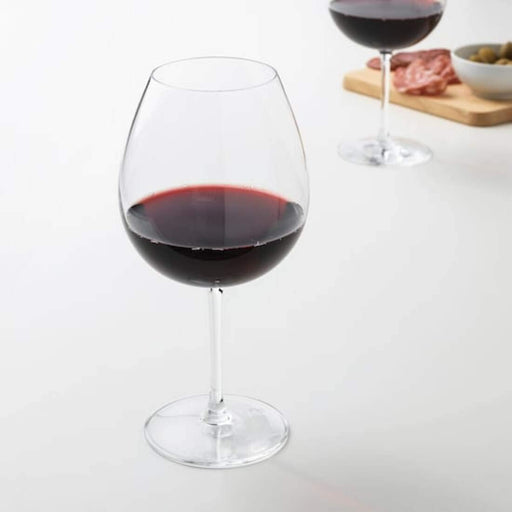 IKEA's clear glass red wine glass, designed to enhance the aroma and flavor of red wine.