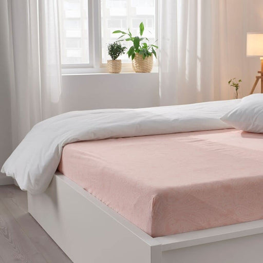 A fitted sheet with a smooth and wrinkle-free finish that gives a neat and tidy look to the bed 70501602