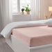 A fitted sheet with a smooth and wrinkle-free finish that gives a neat and tidy look to the bed 70501602