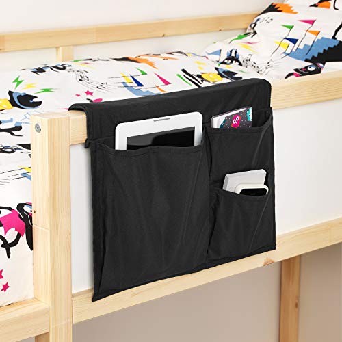  IKEA bed pocket, hanging from a bed frame and holding a book, phone, and other bedside essentials.