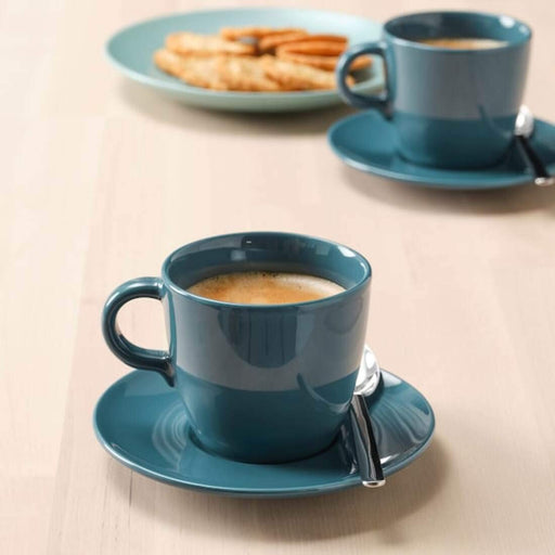 A cup and saucer featuring steaming cups of coffee, perfect for your morning caffeine fix 30481823