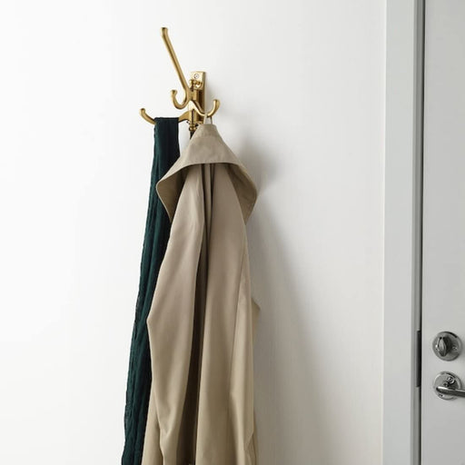 Small, stylish 3-armed hook in brass finish from IKEA 10362265