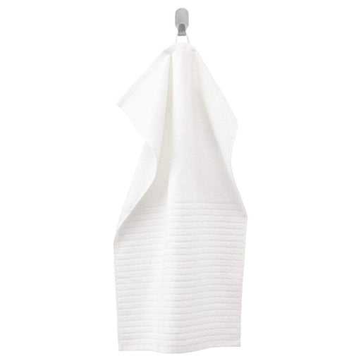 A White hand towel with a soft, smooth texture 00439430
