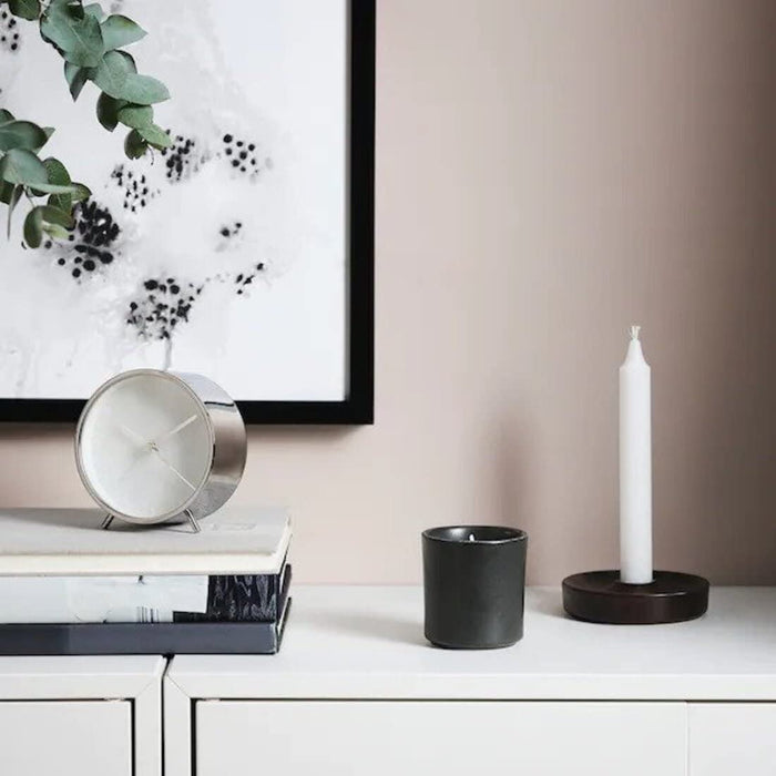 An aromatic and fragrant scented candle in pot from IKEA, designed to delight your senses and provide a comforting glow in any room.