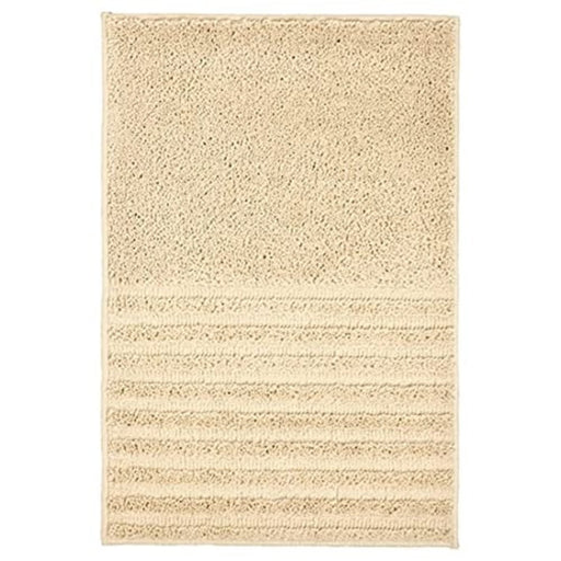 Light beige bath mat from IKEA with plush texture and anti-slip backing for added safety and comfort 00488147