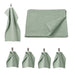 A light green bath towel from the Ikea 6 Piece Combo Set, folded neatly on a white towel rack.