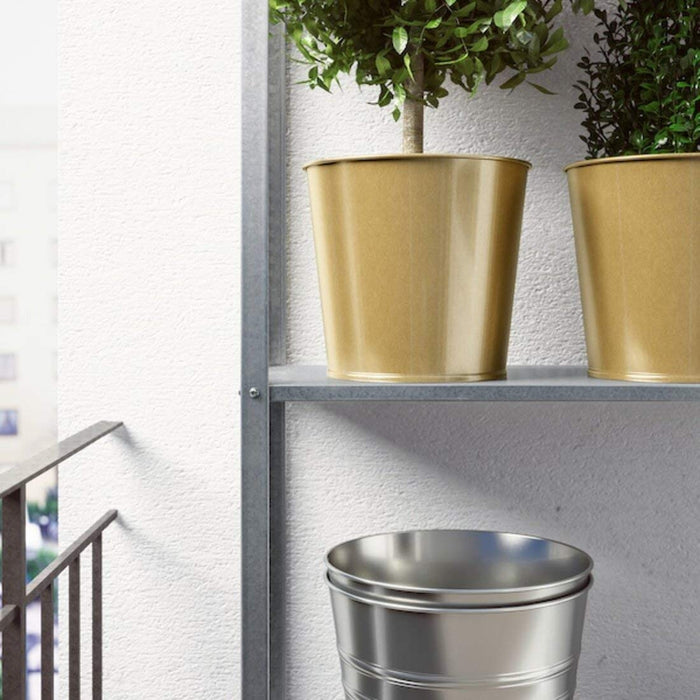 A curved plant pot with a ridged texture and a tapered design. 30359422