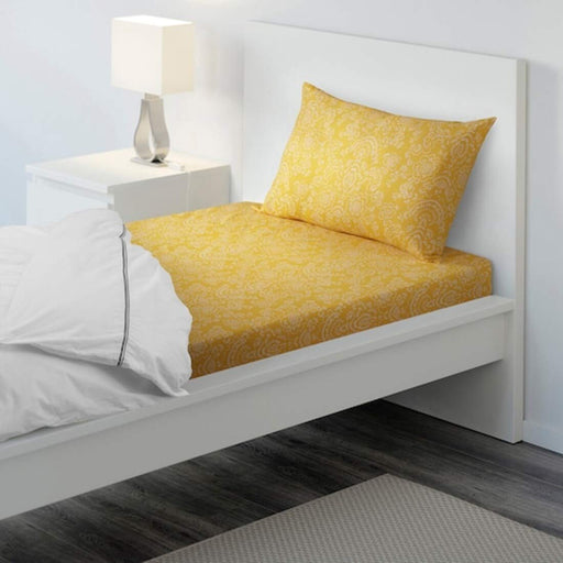 Yellow Cotton flat sheet and pillowcase from IKEA on a bed 10418979