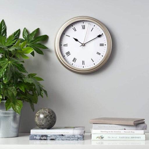 An oversized IKEA wall clock with Roman numerals 80422402