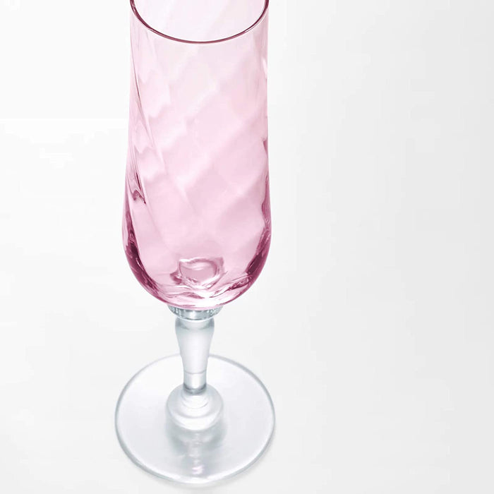 IKEA champagne glass with a clear glass stem and a rounded bowl that is slightly wider at the top
