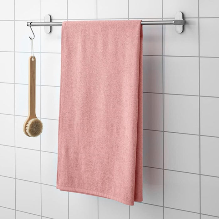 A soft and absorbent pink towel from IKEA, sized 70x140 cm 60456308
