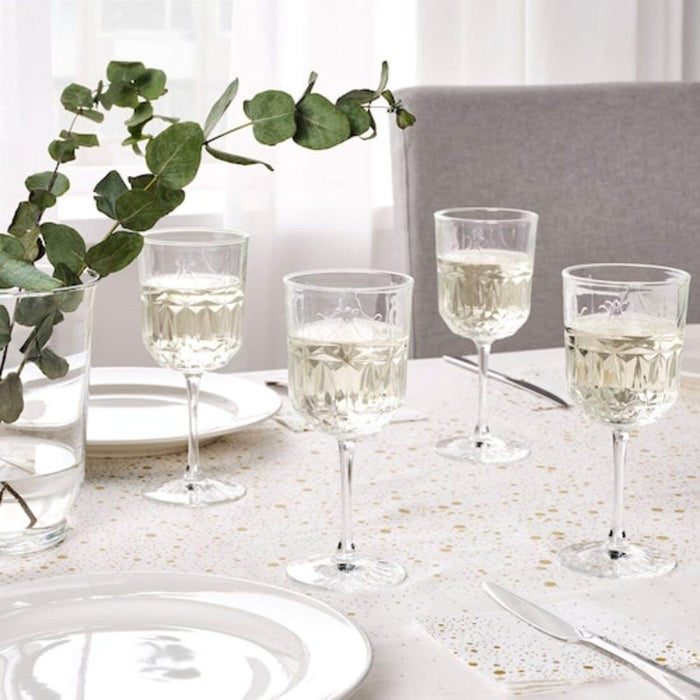 Clear glass IKEA wine glass with a stem, ideal for serving white or red wine"
