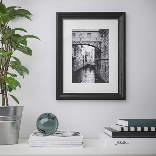 A modern photo frame with a minimalist design, ideal for showcasing your art or photography 90427625