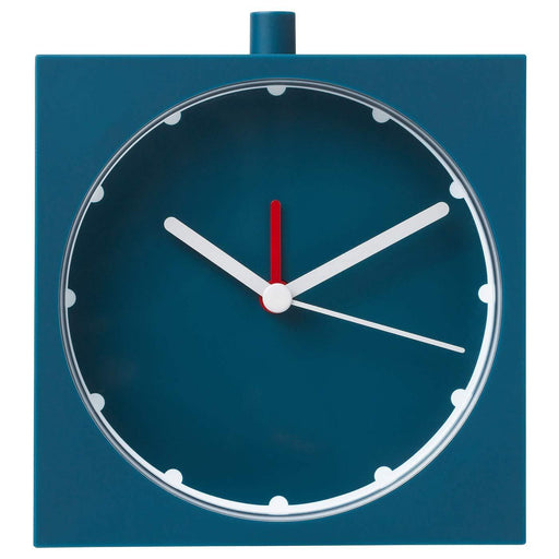 An elegant alarm clock with a sleek metallic finish