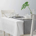 A long, narrow fabric strip that adds a touch of sophistication to your dining table. 10343804
