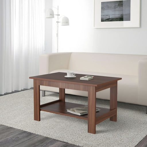 The medium brown IKEA coffee table with a laptop and a cup of coffee, ideal for working from home. 20500407