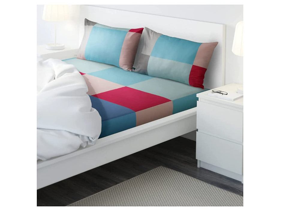 Multicolor cotton flat sheet and 2 pillowcase set from IKEA on a bed 70427589