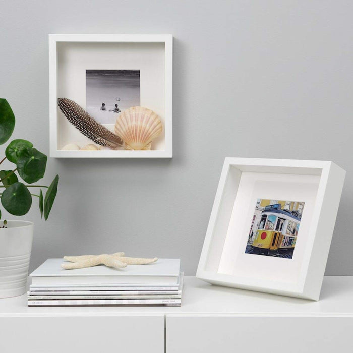This stylish white frame will add a touch of class to your photo display 80459122