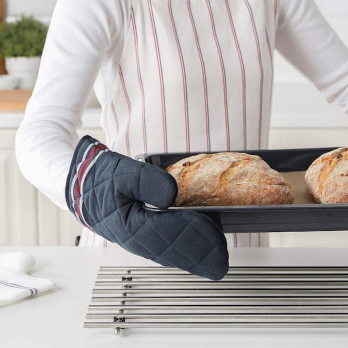 Add some personality to your cooking attire with this trendy and fashionable oven glove from IKEA, perfect for any modern kitchen 80484051