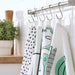A rectangular tea towel with a striped pattern and a loop for hanging 90476357