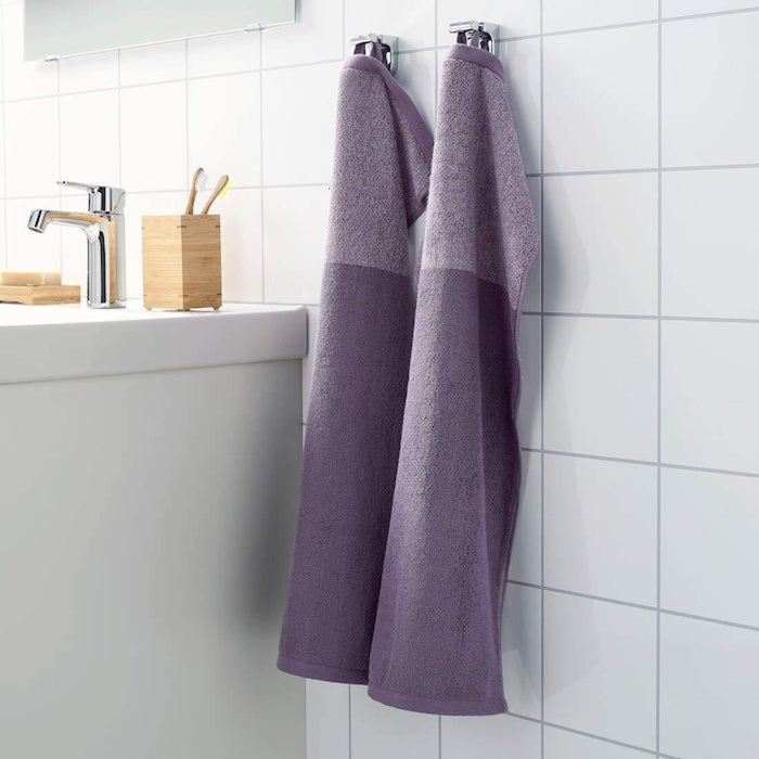An image of an IKEA hand towel in a Lilac/mélange striped pattern, adding a classic and timeless touch to any bathroom  60442806