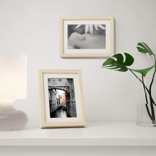 A modern photo frame with a minimalist design, ideal for showcasing your art or photography 90365774
