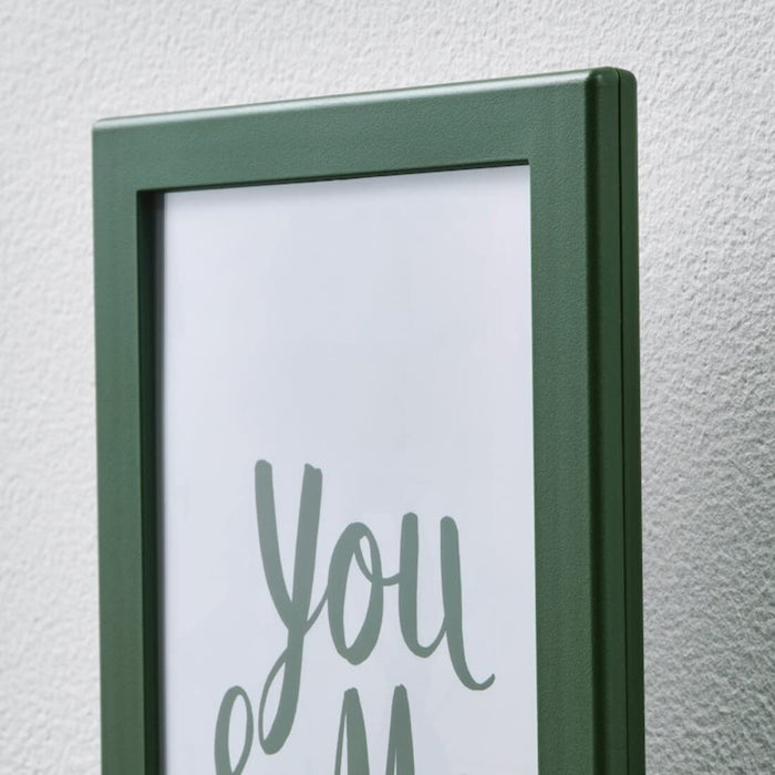 A classic green photo frame that brings a touch of elegance to any room  90478771 