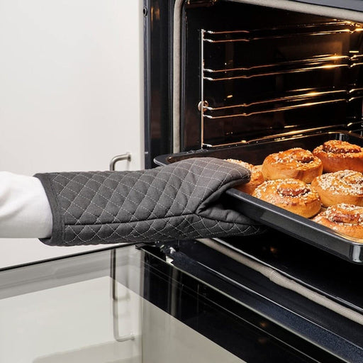 Create a stylish and functional cooking environment with this charming oven glove from IKEA, featuring a flattering fit and eye-catching design 80479605