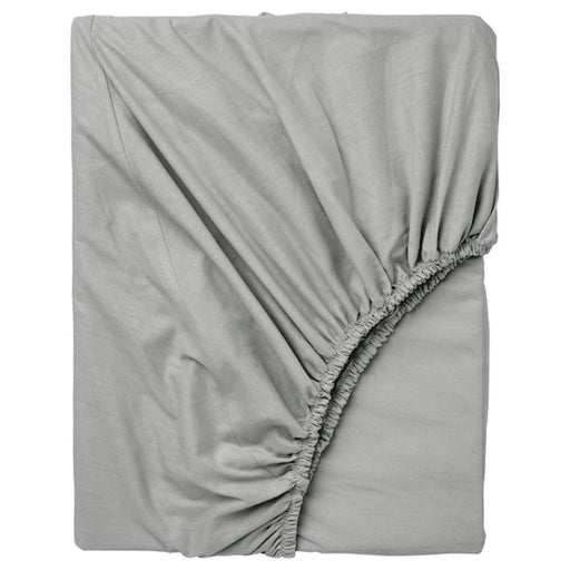 A grey fitted sheet with elastic edges, made of soft and durable material, perfect for a comfortable night's sleep