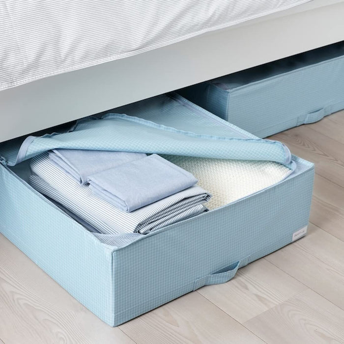 Blue-Grey storage case filled with neatly folded clothes  20493949