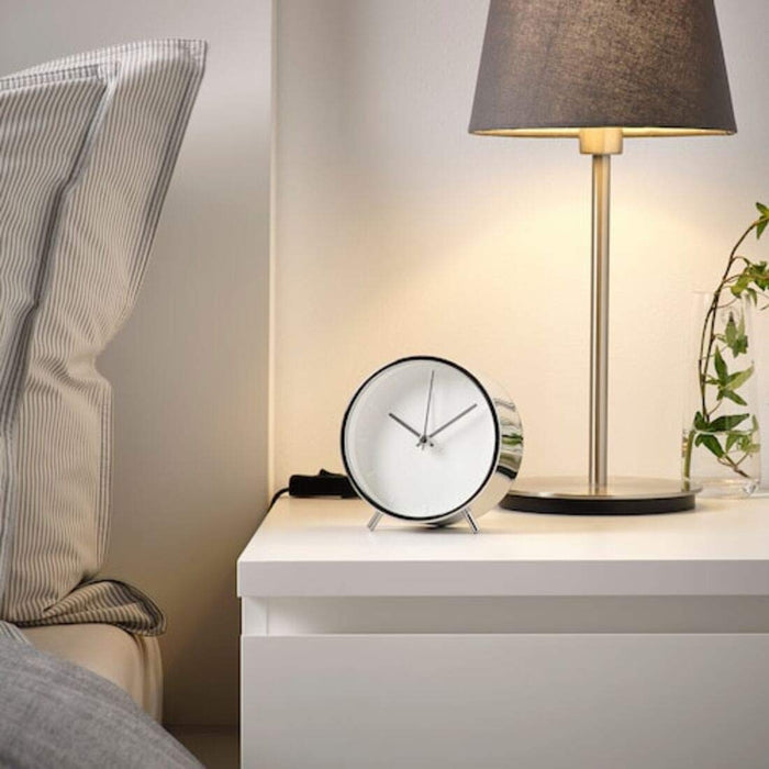 A compact alarm clock with a built-in nightlight  40459261