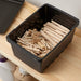 An IKEA storage box and lid for keeping your home organized and tidy.