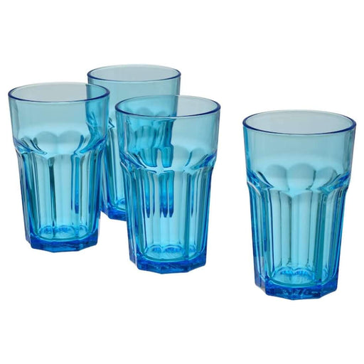A set of IKEA blue glasses, 35 cl, on a table ready to be used 00461020