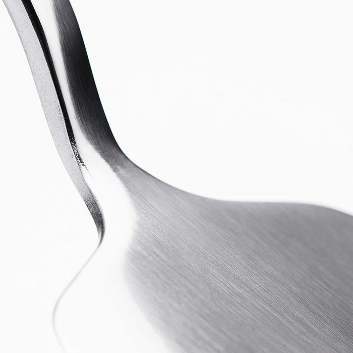 A close-up of a durable and rust-resistant stainless steel blade on an IKEA cake slice 30237874