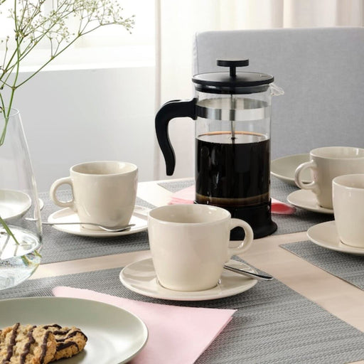 This cup and saucer set is both functional and stylish, adding a touch of sophistication to any table setting 90479431
