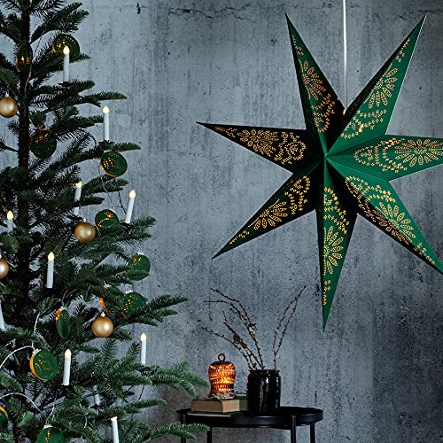 Ikea string lights wrapped around a lush Christmas tree, creating a festive and magical atmosphere 30476727 