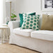Multiple IKEA cushion covers in different colors and designs on a sofa-30456550