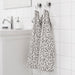 An image of an IKEA hand towel in a white/grey striped pattern, adding a classic and timeless touch to any bathroom 70455596