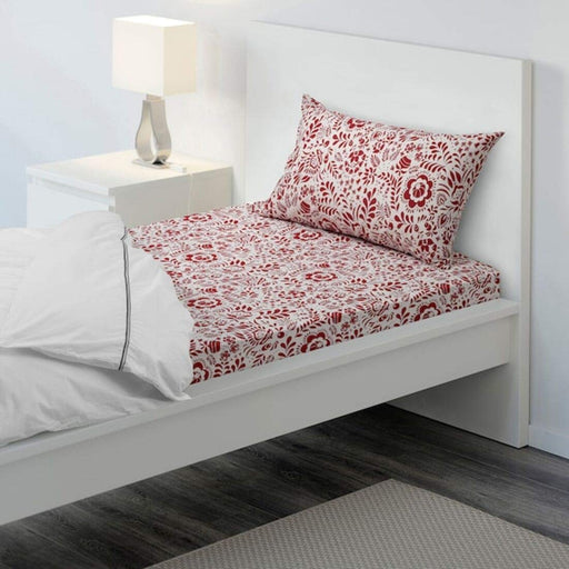 Red-white cotton flat sheet and pillowcase from IKEA on a bed 50494283