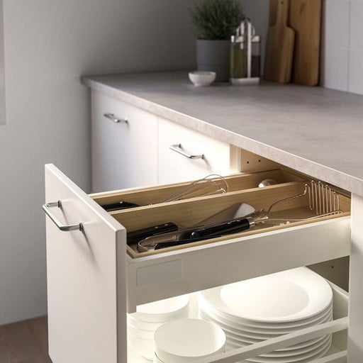 A close-up of the bamboo utensil tray, highlighting the natural bamboo texture and the different compartments for various utensils.