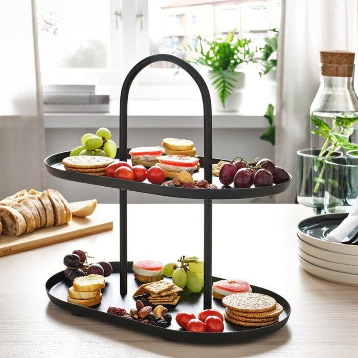 Digital Shoppy IKEA Serving stand, two tiers, blackfor decoration, Kitchenware & tableware, Serveware, Cake & serving stands. dinnerware, home- 30539522, A black two-tier serving stand from IKEA with a sleek and stylish design. The top tier is smaller than the bottom tier and the stand is made of metal. 