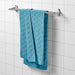 Plush blue bath towel from IKEA, measuring 70x140 cm (28x55 inches), ideal for drying off after a refreshing shower. 90492041