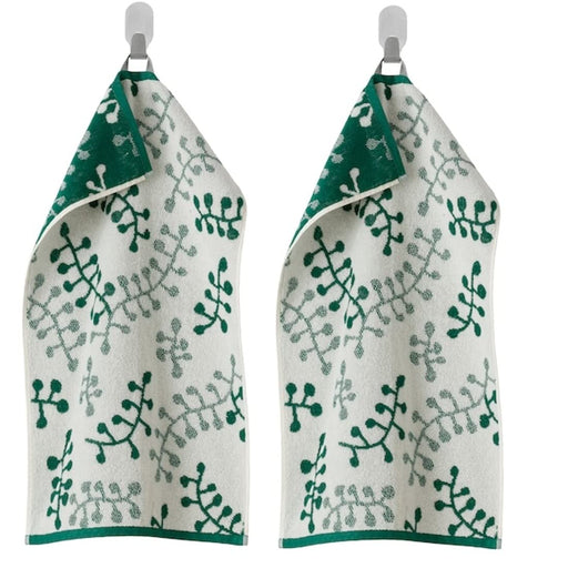A Green/White,  hand towel with a soft, smooth texture 20353618