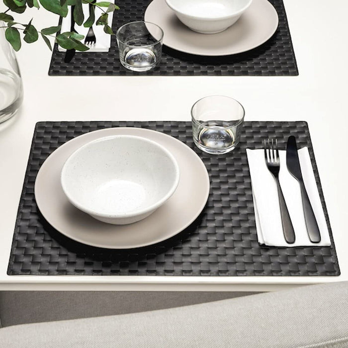 Protect your table from spills and stains with our durable plastic place mats from IKEA 90447100