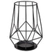 A sleek black metal block candle holder with a round shape, designed to hold a single tea light candle.